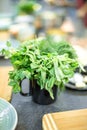 A bowl with a bunch of fresh greens